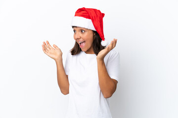Young mixed race woman celebrating Christmas isolated on white background with surprise facial expression