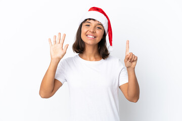 Young mixed race woman celebrating Christmas isolated on white background counting six with fingers