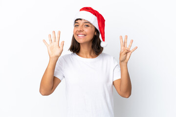 Young mixed race woman celebrating Christmas isolated on white background counting nine with fingers
