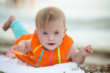 funny little girl with Down's syndrome