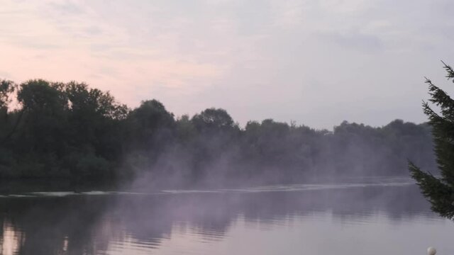 fog over water at dusk 