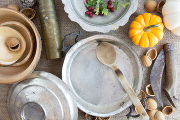 old plate, spoon, retro accessories on the table