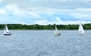 Sailboat race on the Dnieper river in the city of Novaya Kakhovka, Kherson region, Ukraine 09.25.2021. sailing competitions, regatta, sailing