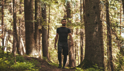 An unusual angle for photography. Walk in the woods. Sports recreation in the wild.