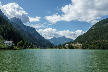 Naklejka na ściany i meble Alleghe town and lake in Dolomity