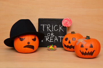pumpkins decorated for Halloween and sweets