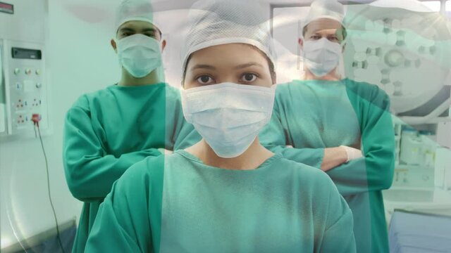 Animation of flag of nigeria waving over surgeons in operating theatre