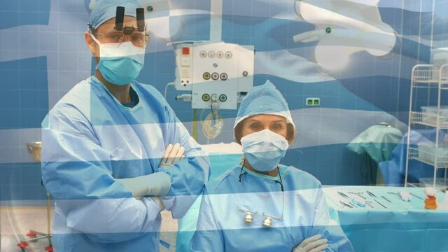 Animation of flag of greece waving over surgeons in operating theatre