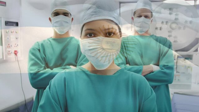 Animation of flag of argentina waving over surgeons in operating theatre
