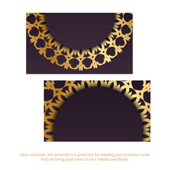 Business card in burgundy color with greek gold pattern for your contacts.