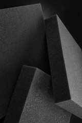 Foam pieces against dark background