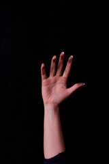 Woman with raised dirty hand