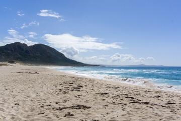Fototapeta na wymiar Beach and sea in Area Maior Beach, in Louro, Muros, A Coruña, with Monte Pindo in the background