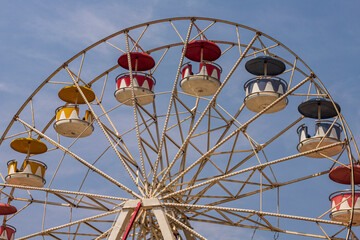 Colorful giant wheels in park amusement