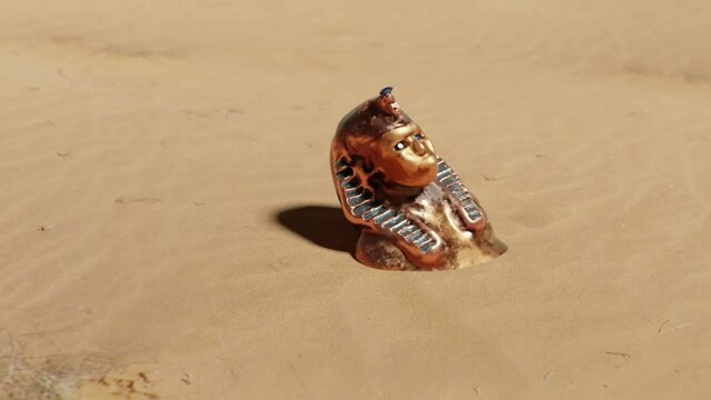 pharoh gold egyptian in sand