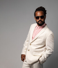 afro cuban with dreadlocks in suit