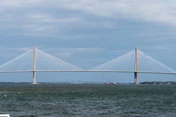 Arthur Ravenel Jr. Bridge taken from the Charleston harbor during a cloudy overcast day