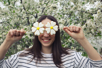 Funny portrait of girl with gingerbread cookies