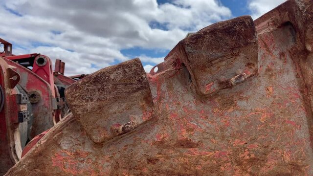 The bucket of a large underground mining loader