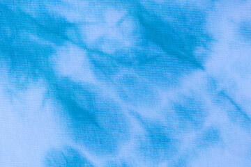 Close up tie dye fabric pattern. Hand made texture.