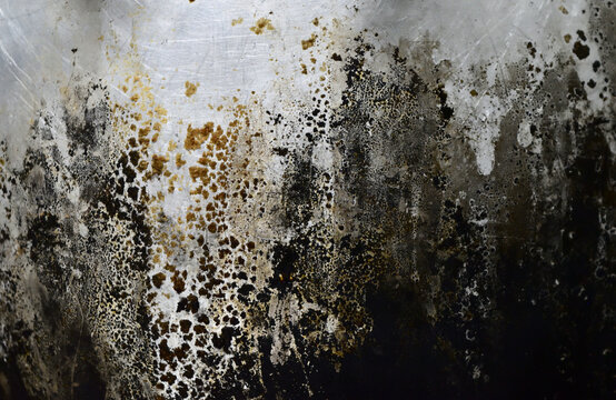 Brown and black color stain on the silver surface that has white scratch on  the area, Burn marks and Scratch effect, Gray abstract grunge background and  texture of old metal 