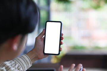 Young man making video call on his smart phone.