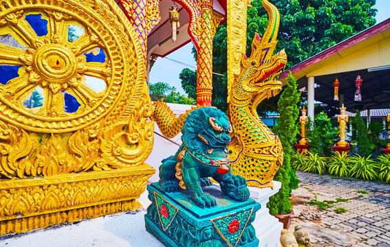 The Wheel Of Dharma, Foo Dog (Chinese Imperial Guardian Lion) And Naga Serpent, Wat Thong Satja Temple, Lamphun, Thailand