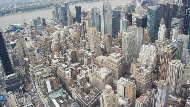 Aerial view time lapse from the top of skyscrapers with street and density of building of Manhattan, New tork