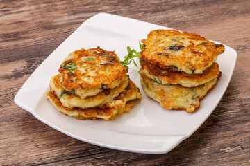 Zucchini pancakes with herbs and spices