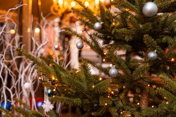 Obraz na płótnie Canvas street Christmas decorations: a wreath with balls and garlands
