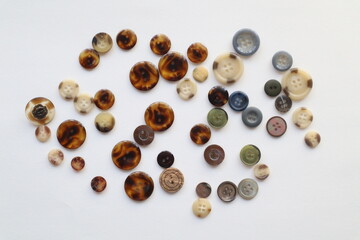 Brown button on sewing tool