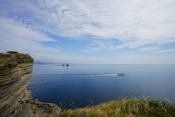 a wonderful seaside landscape with charming clouds