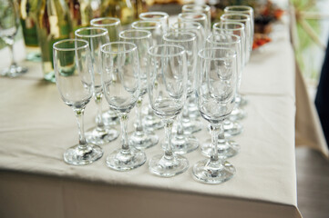 Glasses of champagne at the Banquet, white sparkling wine in wine glasses, festive mood