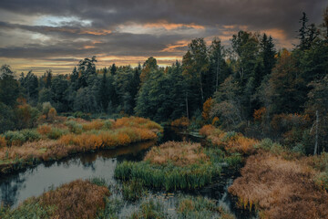 Fototapeta na wymiar Autumn landscape with river at sunset