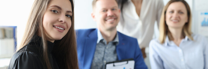 Team of happy business people in workplace