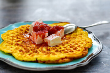 Bakery. Home made ketogenic   waffle pancakes with   organic  bio eggs and home made  strawberry jam  on wooden background. Rustic style breakfast