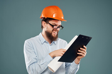 bearded man orange helmet on the head success isolated background