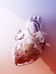glossy toned human heart with ray of light