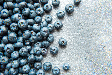 Blueberries on concrete background