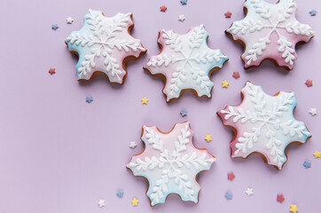 Christmas gingerbread cookies on pink background
