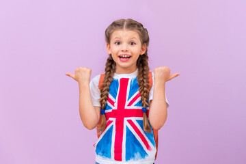 A child in a T-shirt with a British flag points to your ad.