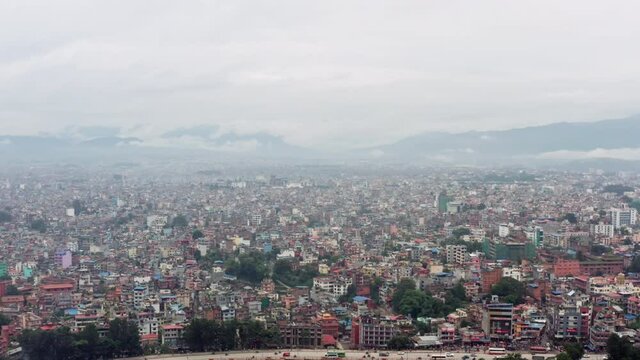 Aerial view Kathmandu Nepal. Cityscape with colorful houses with asian architecture. A metropolis with streets and roads on which cars drive.