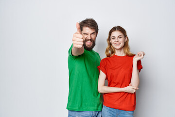 Fototapeta premium married couple hug friendship colorful t-shirts family light background