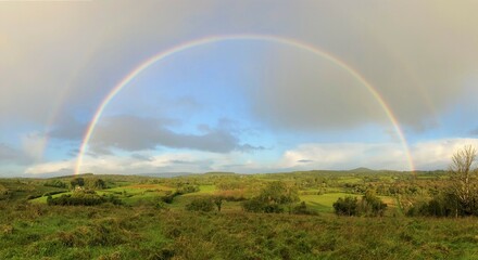 Full rainbow over countryside landscape, Co. Roscommon, Ireland