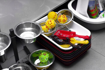 pet store; warehouse with poop trays, bowls and pet toys