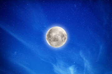 Big full moon on night sky with stars