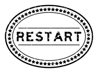 Grunge black restart word oval rubber seal stamp on white background