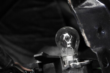 light bulb in the dark black and white
