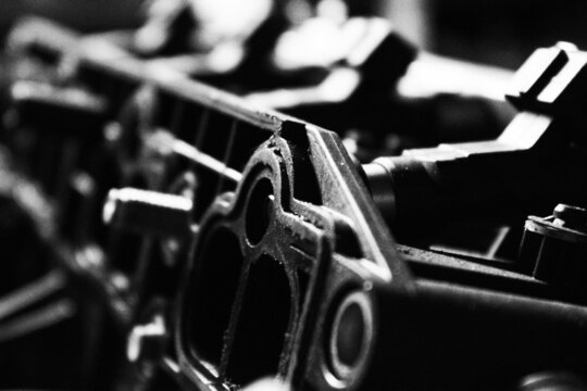 close up of an old engine in black and white
