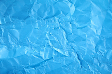 Blue crumpled background or texture.